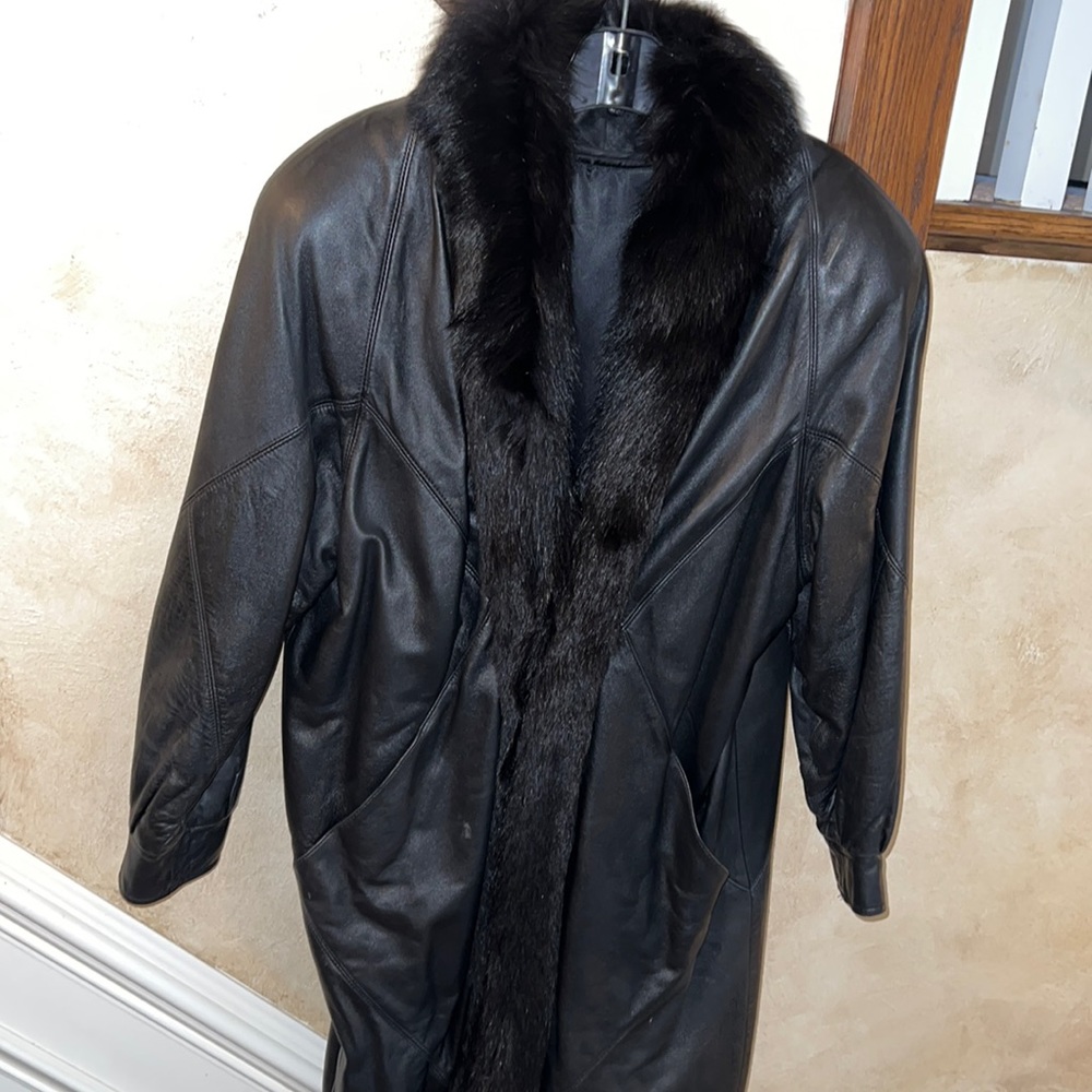 Full length, fully lined leather with fur trim coat